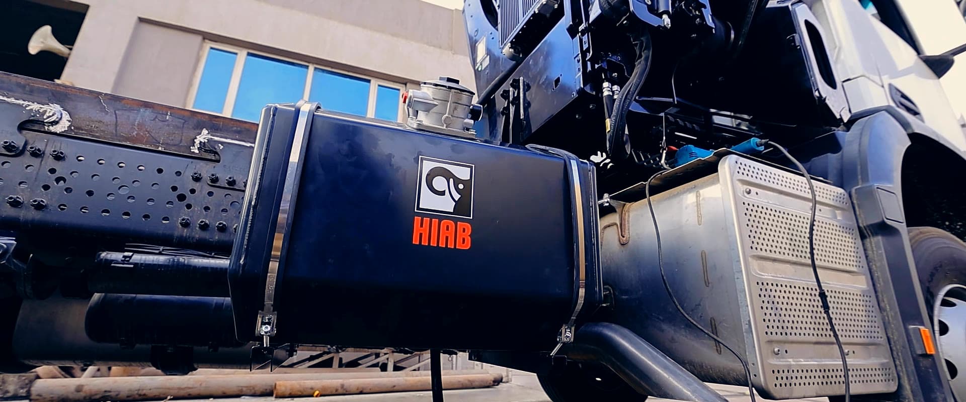 Hiab loader crane mounted on a truck, boom extended
