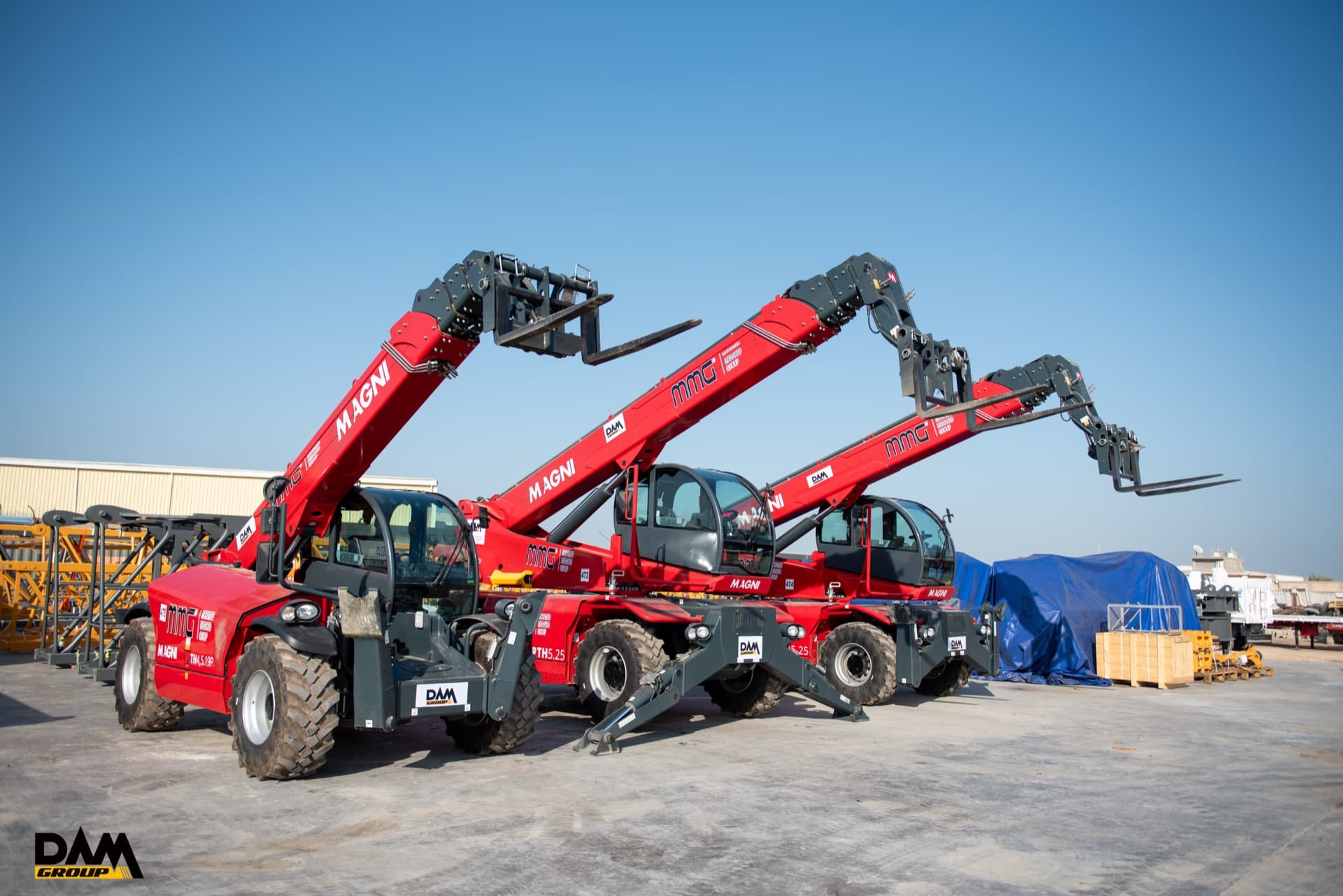 A line-up of Magni rotating telescopic handlers